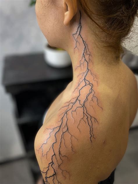 Lightning Tattoo on Woman's Neck