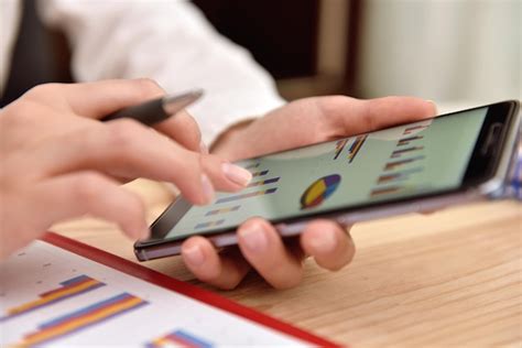 premium photo smart phone  financial data