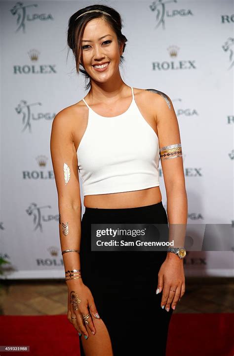 Michelle Wie poses on the red carpet prior to the Rolex Player Awards