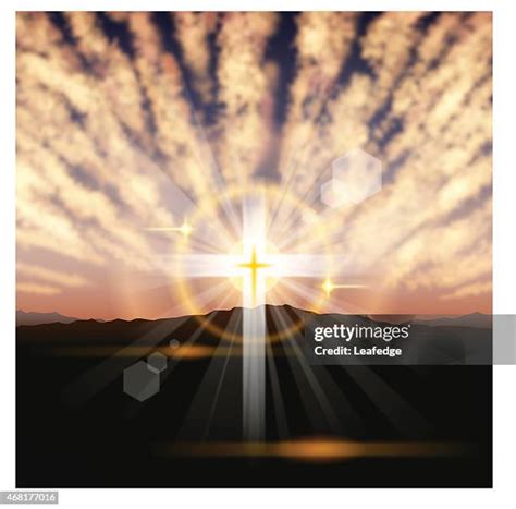 cross  sun rays   premium high res pictures getty images