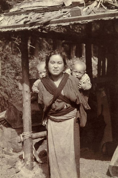 Download Vintage Japanese Mother with her Baby Wallpaper | Wallpapers.com