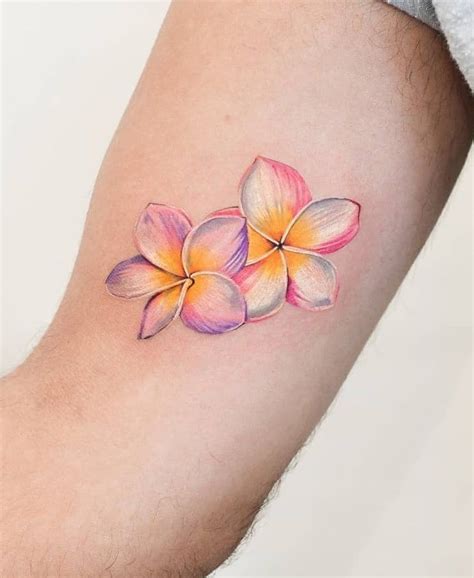 yellow plumeria flower tattoo