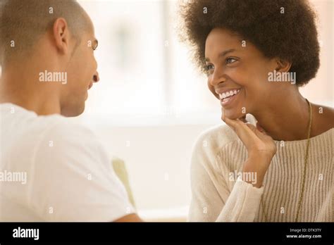 couple talking indoors stock photo alamy