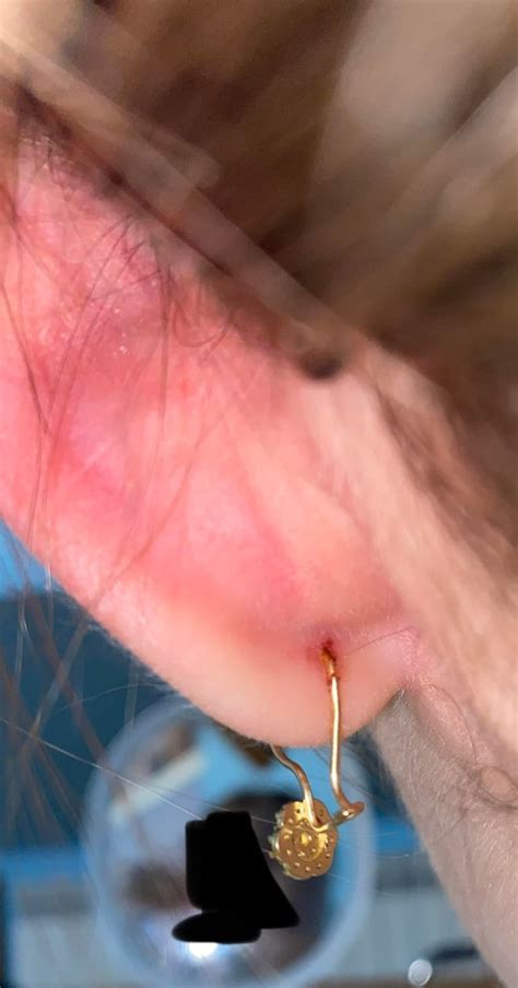 how long should i wait to change my lobe piercing