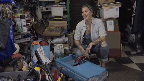 American Pickers' Danielle Colby shows off stomach and chest tattoos in