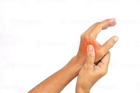 Hand of a woman suffering from hand pain on white background with ...