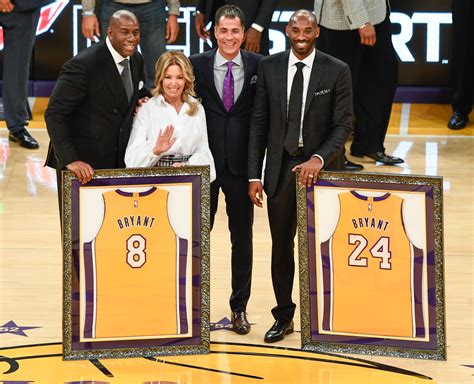 Lakers team executives Earvin \”Magic\” Johnson, Jeannie Buss and Rob