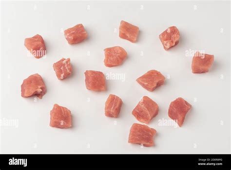 fresh pork diced  small cubes  white background cooking  stock