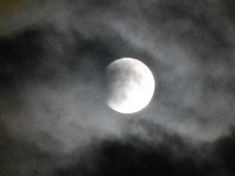 moon in the clouds by tom clausen | tom clausen