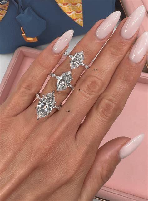 marquise cut diamond engagement ring  hidden halo