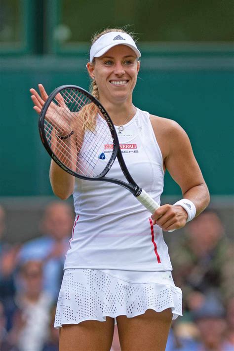 Download Angelique Kerber And Her Racket Wallpaper | Wallpapers.com
