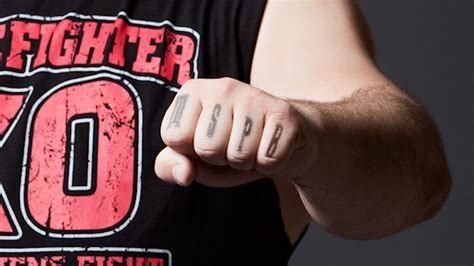 Kevin Owens' Tattoos - What Do They Mean? | PWPIX.net