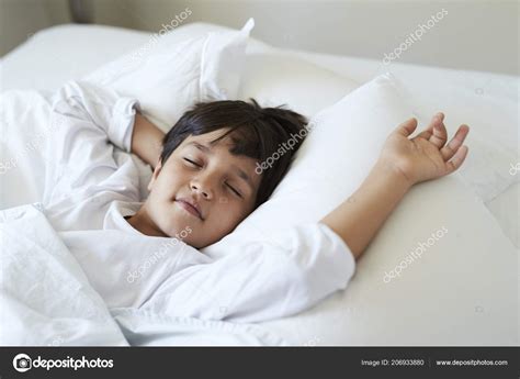 Sleeping Boy Lying Back Bed Stock Photo by ©sanneberg 206933880