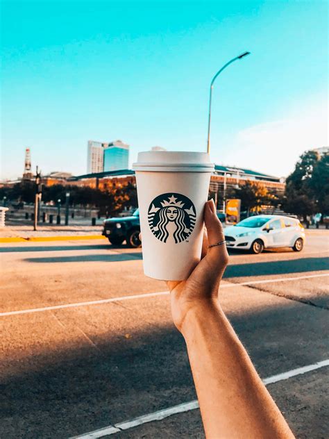 Download Disposable Coffee Cup Of Starbucks Hd Wallpaper | Wallpapers.com