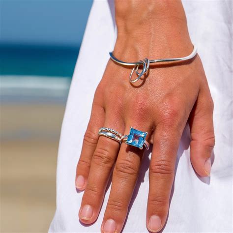 Square Solitaire Blue Topaz Ring - Prong Set in Textured Sterling