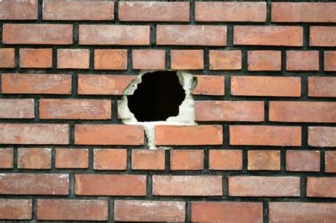 breaking brick wall stock  images  backgrounds