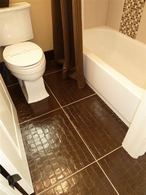 Textured porcelain tile floor and glass mosaic in shower | Tile floor ...