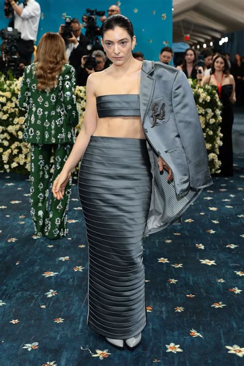Lorde goes almost topless at Met Gala 2025 as she wears gravity-defying