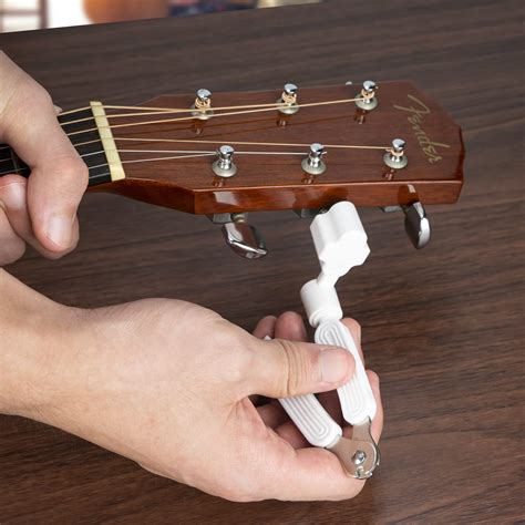 how to replace acoustic guitar strings 4