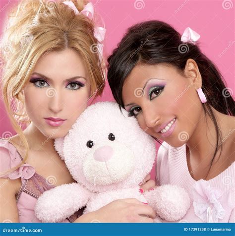 Blonde and Brunette Girls Hug a Pink Teddy Bear Stock Photo - Image of