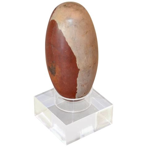 Antique Indian Tantric Shiva Lingam Stone on a Clear Lucite Stand at