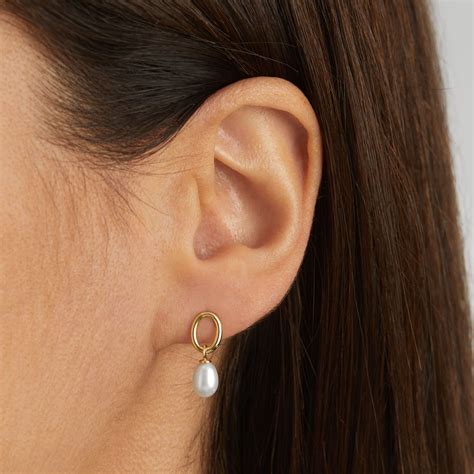 goldsmiths ct yellow gold oval freshwater pearl drop earrings