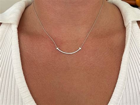 Tiffany and Co. T Small Smile Pendant Necklace in Sterling Silver at