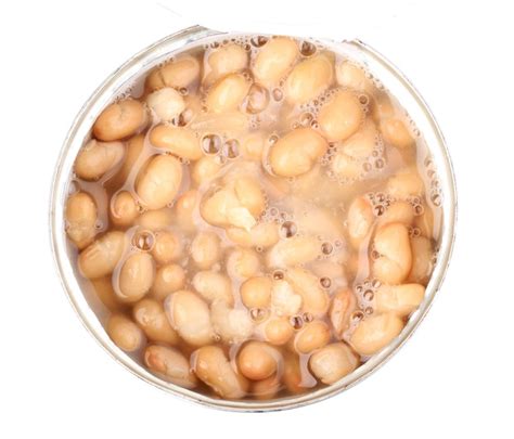 premium photo open tin   beans closeup isolated  white