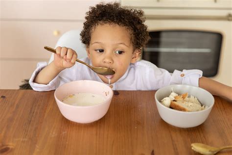 Little Boy Eating Cereal · Free Stock Photo