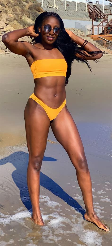 Chiney Showing Off Abs in Yellow Bikini : r/ChineyOgwumike__