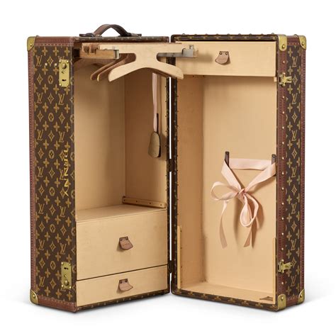 A RARE, MONOGRAM CANVAS DOLL WARDROBE TRUNK WITH BRASS HARDWARE, LOUIS