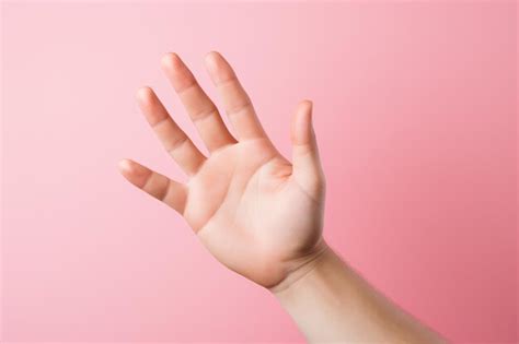 Premium AI Image | Waving Hand hand gesture on pink background