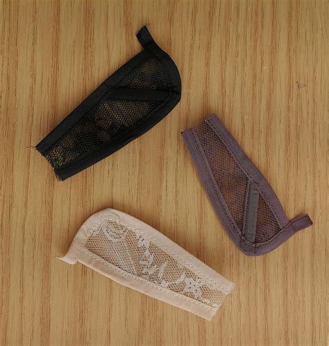 Hold down those wigs Ear Flaps Ear Tabs Wig Springs A set of 2 Wig