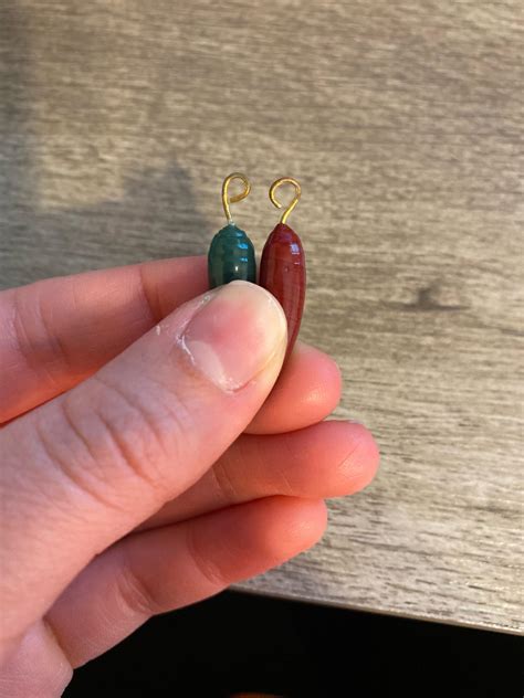 Glass bead has tarnishing metal : r/Beading