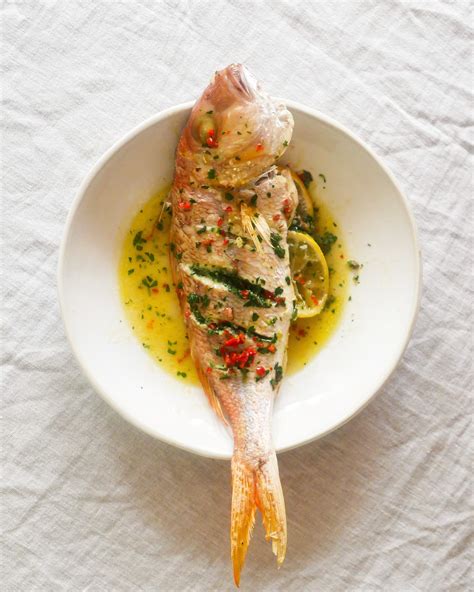 Green Anchovy Butter Lathered Whole Baked Fish Recipe | The Feedfeed
