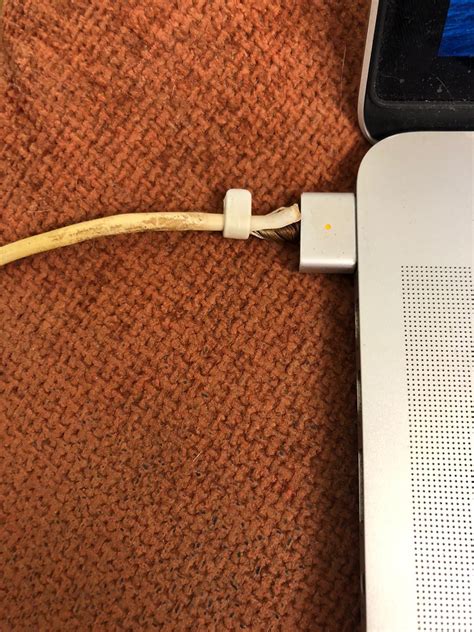 MacBook Pro burnt charging pin. MagSafe untouchably hot. After going