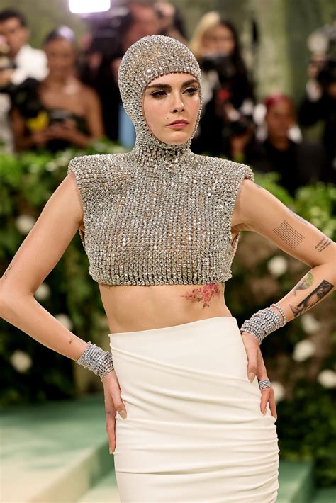 Cara Delevingne Shines Bright With a Jeweled Body Armor and Soft Glam