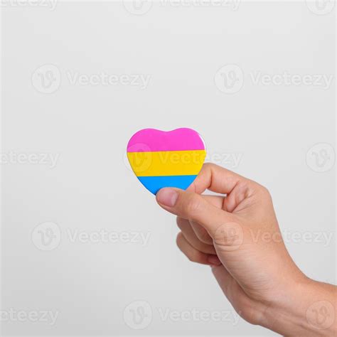 Pansexual Pride Day and LGBT pride month concept. hand holding pink