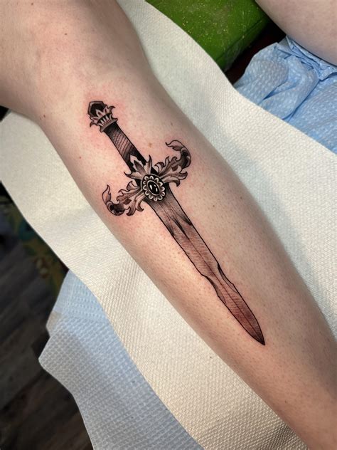 ancient sword tattoos  cool sword tattoo design ideas