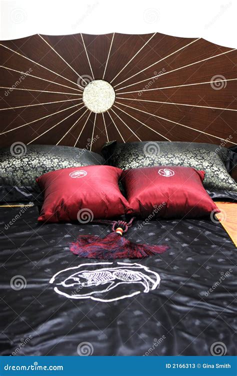 Bed with satin sheets stock image. Image of residential - 2166313