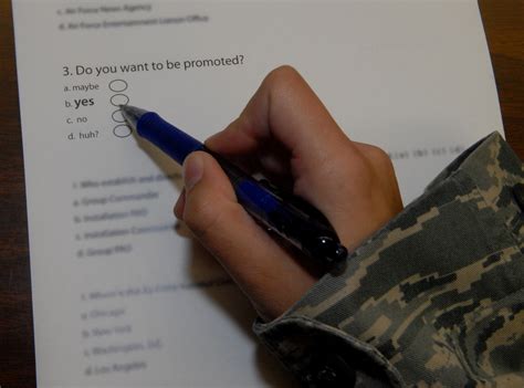 Airmen debate the latest testing requirements for AF master sergeant 22