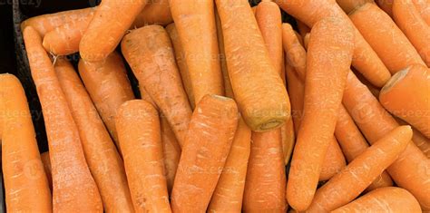 Fresh produce of carrots spring food vegetable. Fresh big orange carrot ...