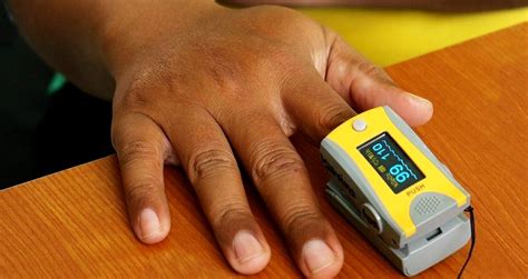 FDA reviews evidence pulse oximeters less accurate on people with ...