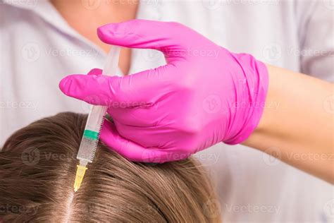 woman receives injection  head  stock photo  vecteezy