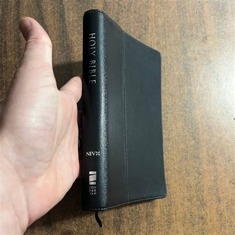 NIV 1984 Thinline Bible - Ebony Black Renaissance Genuine Leather - Out