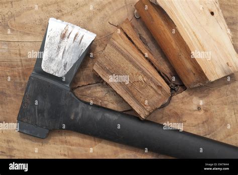 modern axe tool  man  plastic handle  chopping firewood logs