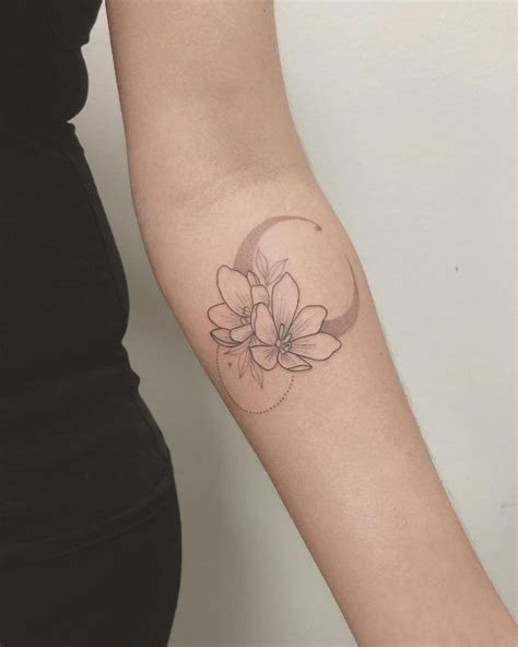 Flower moon tattoo in fine line