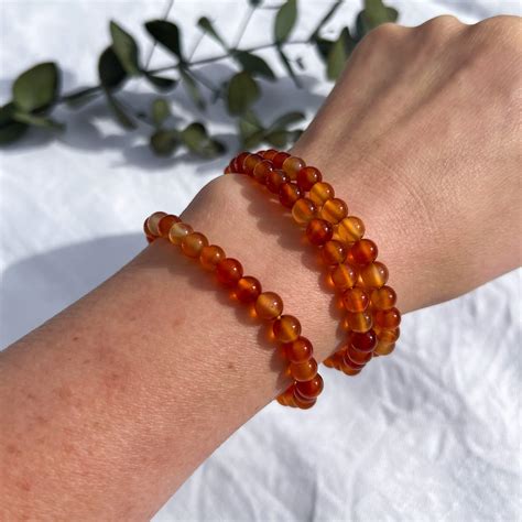 carnelian crystal bead bracelet  courage motivation rock realm