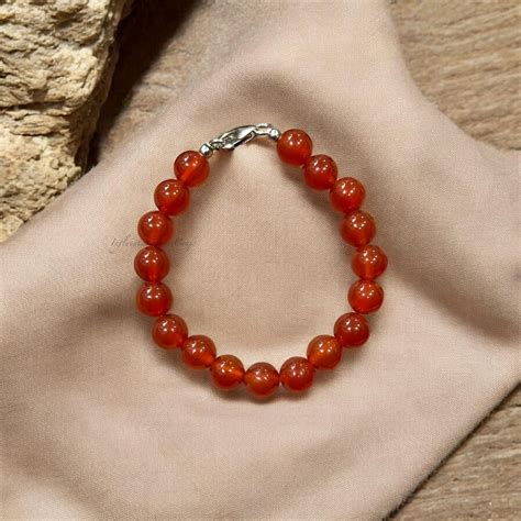 natural red carnelian beaded bracelet  sterling silver clasp