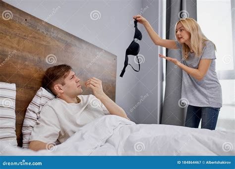 What it is Woman with Strange Bra in Hands, Man Cheated on His Wife